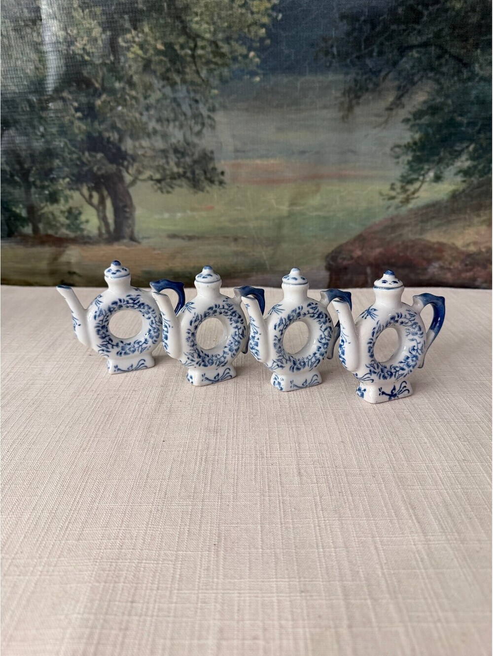 Set of 4 blue and white miniature teapots
